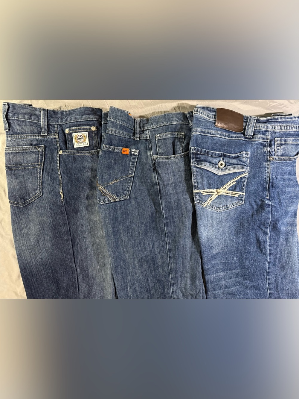 Lot Of 3 Men’s 33x30 Denim Blue Jeans, Wrangler, Cinch, and Axel